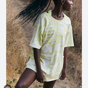 FP movement free people hot shot printed tee romper Sunday market zest onesie